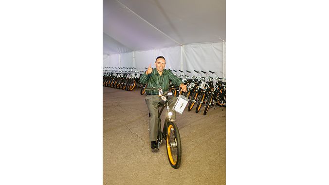 A Saris employee rides his new custom Electra.