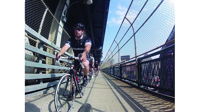 Interbike’s Justin Gottlieb leads the way on one of several bridge crossings the Dealer Tour would make over three days of visiting shops.