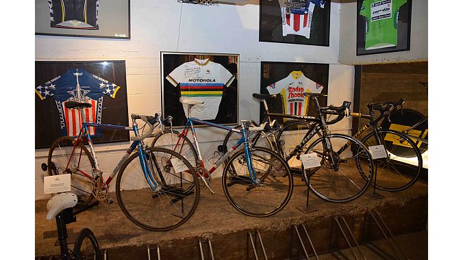 The shop serves as something of a museum for Armstrong’s competitive race bikes, including this downstairs display highlight major victories from early in his career.