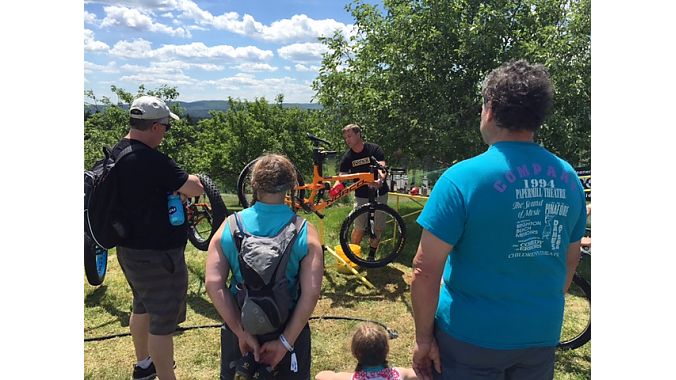 Matthew Bracken of Pedro’s, NEMBAfest’s title sponsor, puts on a bike washing clinic for expo-goers.