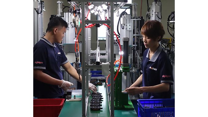 Workers assemble pedals, one of Marwi’s largest product categories.
