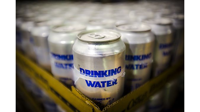 Colorado brewer Oskar Blues shut down beer canning to produce 220,000 cans of water for Houston. 