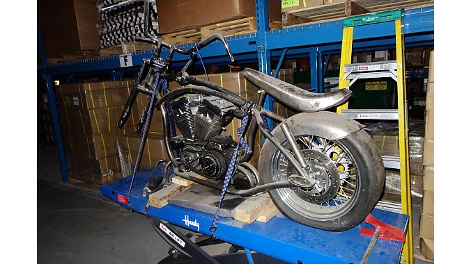 Eric Hawkins started this chopper project a few years ago. Note the cantilever frame and Crate-style stick shift