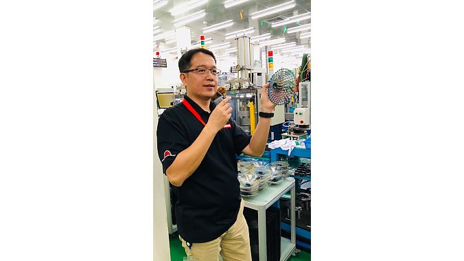 SRAM Asia GM/engineering manager Bob Chen shows off a mountain bike cassette.