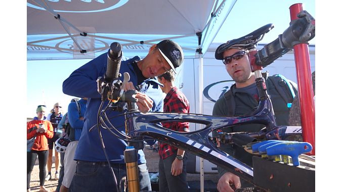 Ibis founder Scot Nicol, left, sets up a bike for Seattle's Todd Denkinger.