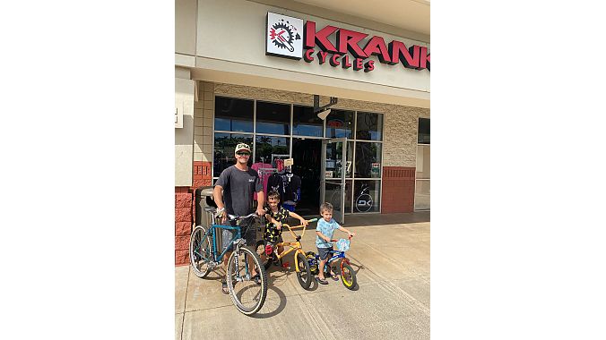 West Maui Cycles employee with bikes from Krank Cycles.