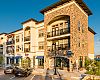 Outside Giant Lakeside in Flower Mound, TX. The business occupies the ground floor in one of the upscale residential/commercial spaces in The Shops at Lakeside.