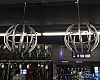 The store designer at I. Martin chopped up rims to make these chandeliers and hung them with bike chains above the cash wrap at the front of the store.