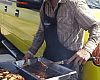 Bell's Allan Cooke, a vegan, cooks up some chicken and ribs for the demo.