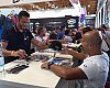 Fans line up for autographs from Cedric Gracia, Richie Schley and Darren Berrecloth at the iXS booth.