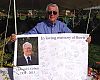 Gene Smith with a banner signed at Interbike by Cohen's friends