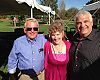 Gene Smith and Scott McCaskey flank Kay Cohen, Howie's widow.