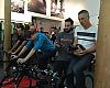 Neil Shirley of Road Bike Action, Caley Fretz of Velo, and Ben Delaney of BikeRadar.com demo Zwift's gaming based software at the Tuesday media event.