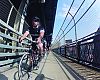 Interbike’s Justin Gottlieb leads the way on one of several bridge crossings the Dealer Tour would make over three days of visiting shops.