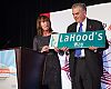 New York City Transportation Commissioner Janette Sadik-Khan presents outgoing U.S. Transportation Secretary Ray LaHood with an honorary NYC street sign.