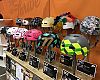 QBP staff spent weeks decorating helmets to show off its creativity in teh Heads Up helmet show at Frostbike's helmet showcase booth.