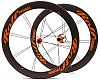 A Built on Demand wheelset with orange hubs and decals.