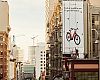 Cannondale's Adventure Neo billboard going up in San Francisco.