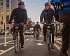 Hill Abell (left), owner of Bicycle Sport Shop in Austin, Texas, and Brandon Buth, advocacy manager for Trek Bicycle, chat while on a ride Monday as part of a tour hosted by Bikes Belong Foundation's Green Lane Project.