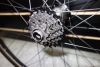 The 9-21 7-speed cassette comes with the wheel. 