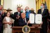 The signing ceremony Tuesday. White House photo. The signing ceremony Tuesday. White House photo.