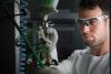 Mark Cavendish painting a Green Fade Oakley. Mark Cavendish painting a Green Fade Oakley.
