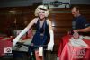 An attendee in her Hollywood glam costume checks out one of the many silent auction items. An attendee in her Hollywood glam costume checks out one of the many silent auction items.