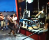 In a bystander's video, an Easyrider employee fights to keep a bike. In a bystander's video, an Easyrider employee fights to keep a bike.