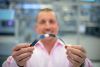 Exeger founder Giovanni Fili with a wireless-headphone sized solar cell. Exeger founder Giovanni Fili with a wireless-headphone sized solar cell.