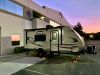 A Marin Bikes employee camps out in the office parking lot.