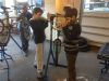 Kids at Bike Works test their skills after a class on headset repairs.