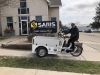 Chris Fortune pilots the e-delivery bike. 