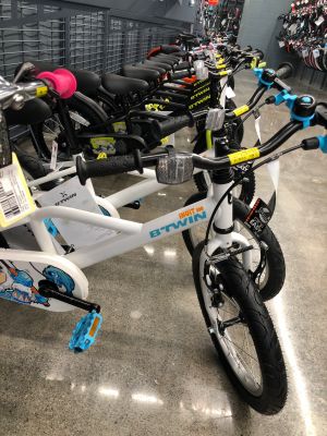 The store's bike selection starts with kids' models. 